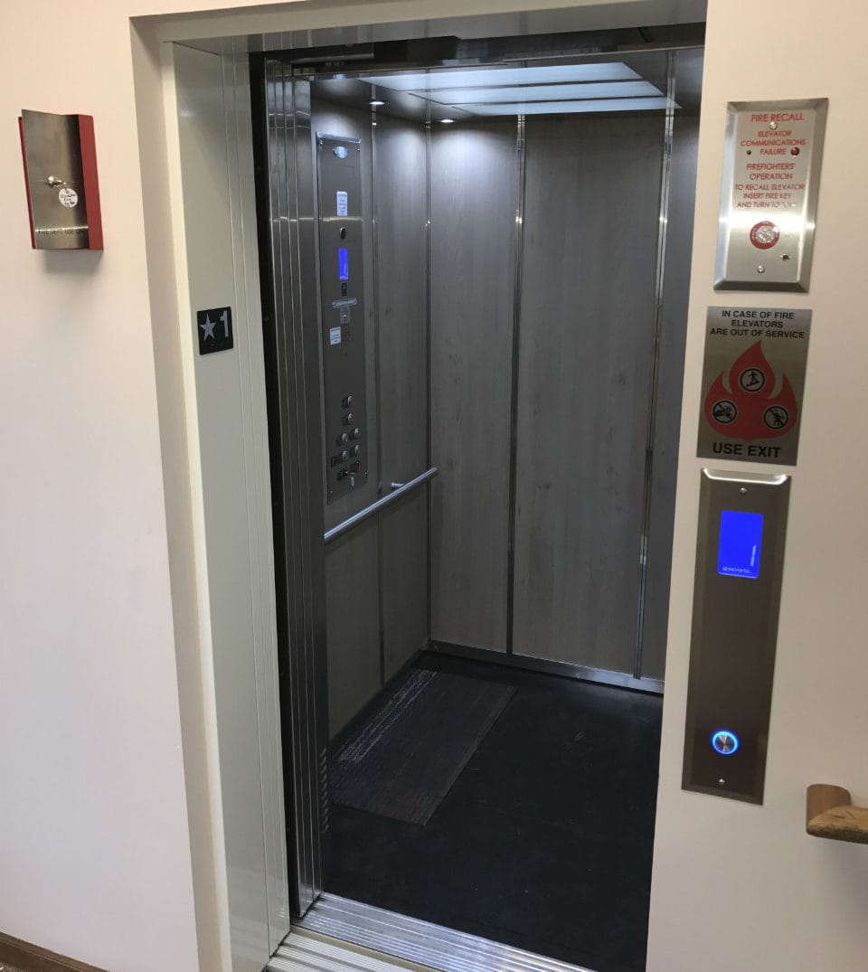 Elevator with doors open.